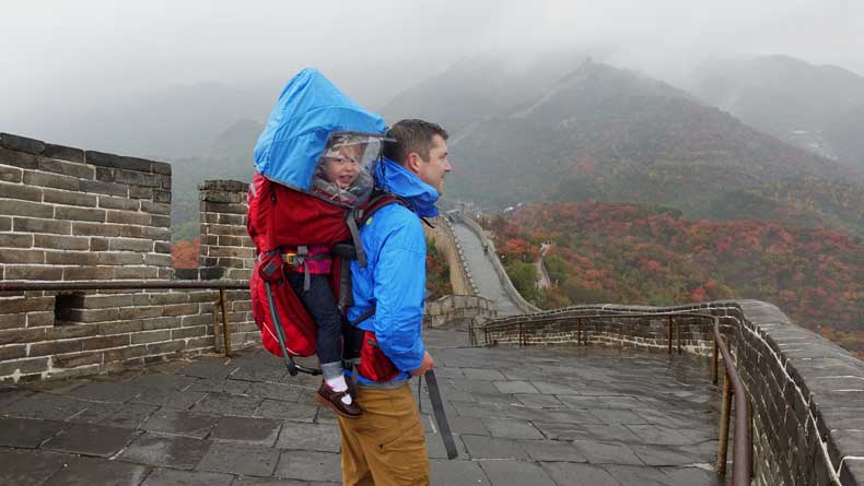 Great Wall of China with kids - father wearing child in Deuter Kid Comfort 3 Child Carrier