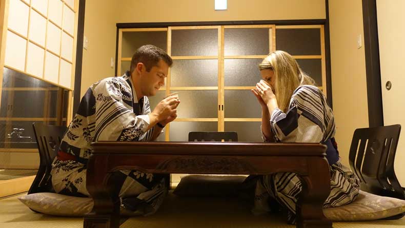 Couple having tea in the Tamami room at Rinn Gion yasakamae- one of the bst places to stay in Kyoto Japan
