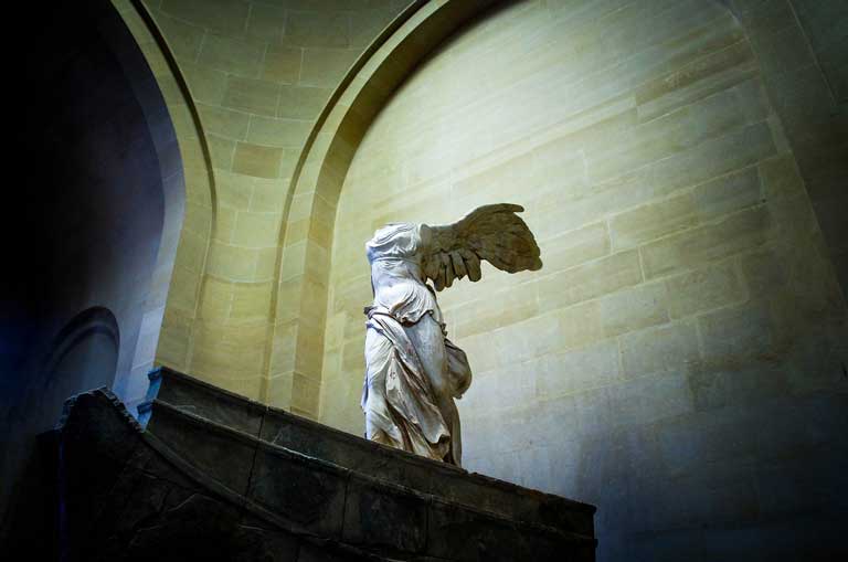 The Winged Victory of Samothrace, one of the most famous sculptures in the Louvre Museum in Paris