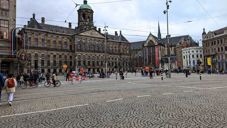 The Royal Palace from across Dam Square in Amsterdam, a must-visit plaza on any 3 day itinerary for Amsterdam.