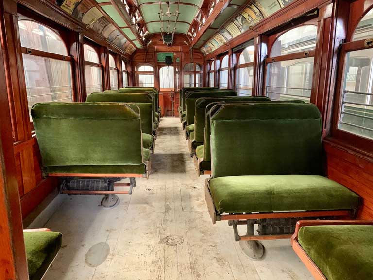 Inside of an antique trolley car