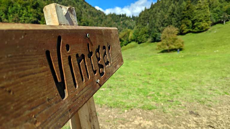 A wooden sign that says Vintgar outside the Vintgar Gorge in Slovenia
