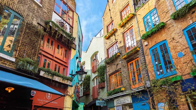 Neal's Yard, a small, colorful alleyway in London's Covent Garden neighborhood.