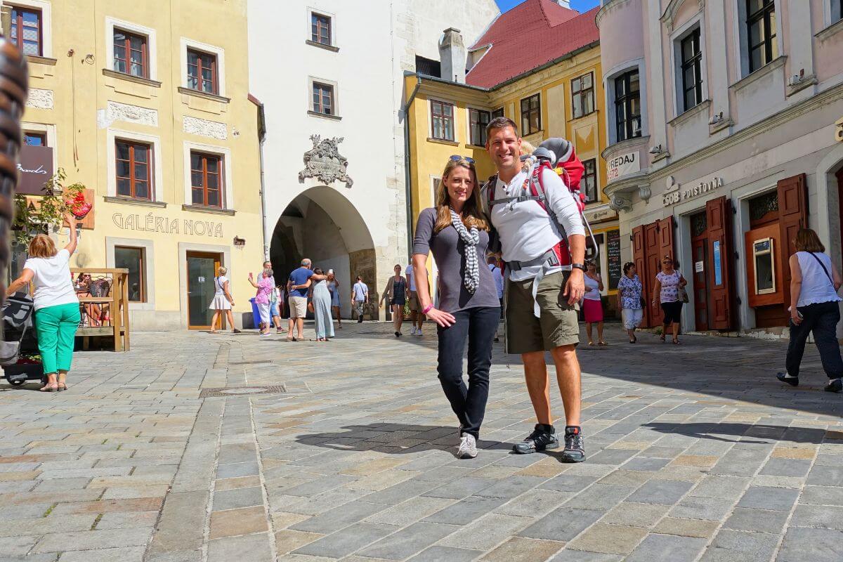 our family posing for a photo in front of St. Michael's Gate during our Bratislava day trip