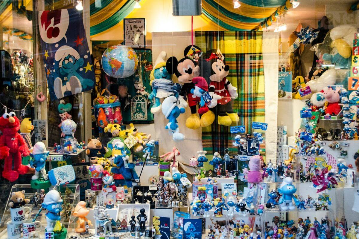 smurf souvenirs from belgium in a store window in brussels