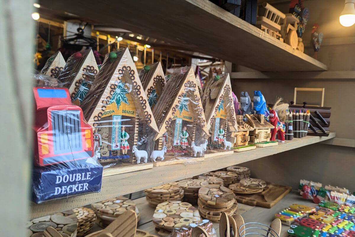 wooden toys for sale at a market stall in krakow