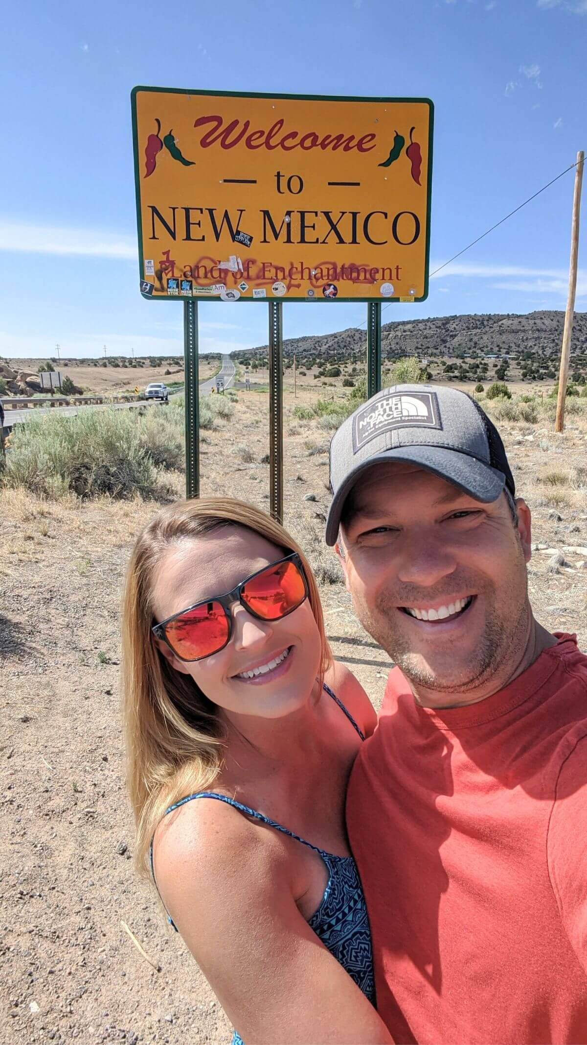 us in front of a welcome to new mexico sign
